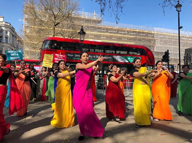 Indian community women welcome Prime Minister Narendra Modi in London on Wednesday. (PTI) Indian community women welcome Prime Minister Narendra Modi in London on Wednesday. (PTI)