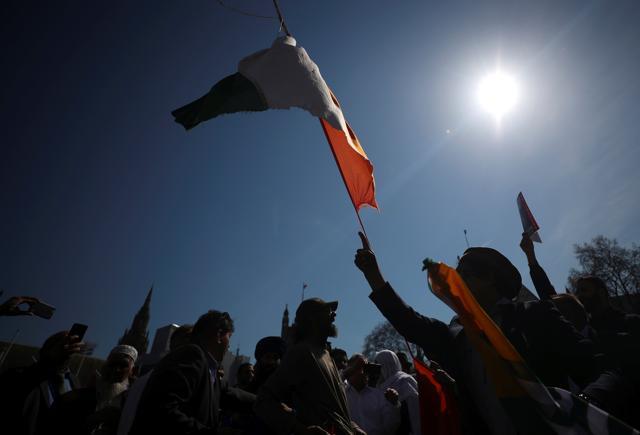 Protesters rip up India's flag after tearing it off a flagpole in Parliament Square, London, Britain, April 18, 2018. (REUTERS) Protesters rip up India's flag after tearing it off a flagpole in Parliament Square, London, Britain, April 18, 2018. (REUTERS)