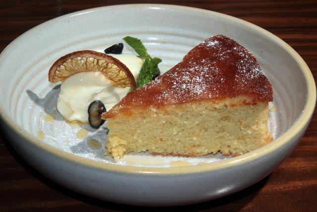 The Orange and Almond Cake is amazingly soft and tastes heavenly with the zesty mascarpone and lemon drizzle. (Shivam Saxena/HT Photo)