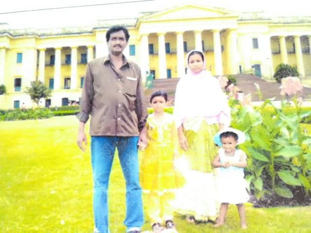 A photograph shows Asaduddin Sadique with his late wife, Nurjahan Bibi, and two daughters. A photograph shows Asaduddin Sadique with his late wife, Nurjahan Bibi, and two daughters.
