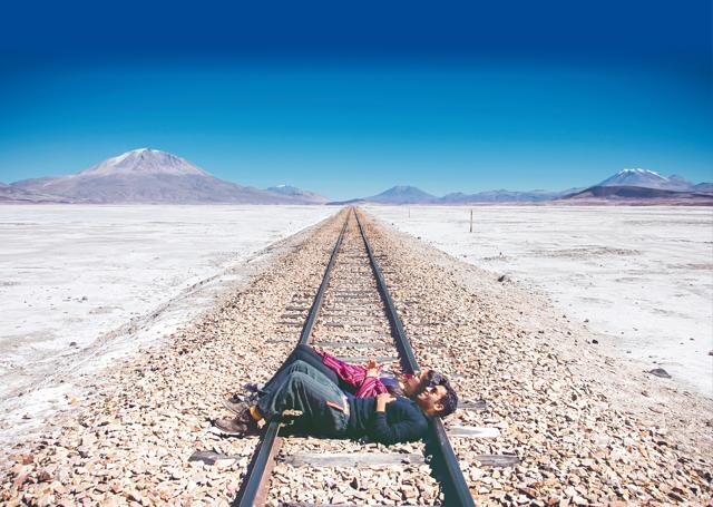The couple drove across Salar de Uyuni in Bolivia in their SUV with food and oxygen cylinders; (On Savi) top and shawl, Peru local market; tights, Adidas. (On Vid), sweater, Zara; bottoms, Peru local market The couple drove across Salar de Uyuni in Bolivia in their SUV with food and oxygen cylinders; (On Savi) top and shawl, Peru local market; tights, Adidas. (On Vid), sweater, Zara; bottoms, Peru local market