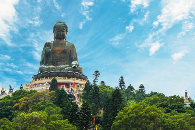 Tian Tian Buddha also known as a Big Buddha which sits hidden atop a hill in the scenic Lantau Island. (Shutterstock)