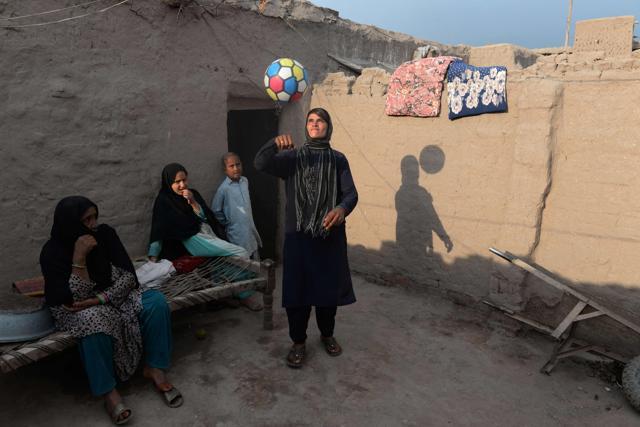 Sitara Wafadar plays with a ball at her home in Sultanpur village in Surkh Rod district. (AFP) Sitara Wafadar plays with a ball at her home in Sultanpur village in Surkh Rod district. (AFP)