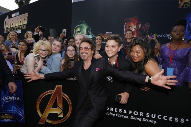 Actor Robert Downey Jr. poses with fans. (REUTERS) Actor Robert Downey Jr. poses with fans. (REUTERS)