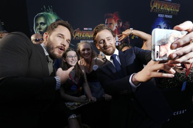 Actors Chris Pratt (L) and Tom Hiddleston pose with fans. REUTERS/Mario Anzuoni (REUTERS) Actors Chris Pratt (L) and Tom Hiddleston pose with fans. REUTERS/Mario Anzuoni (REUTERS)