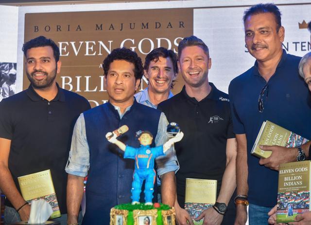 Rohit Sharma, Sachin Tendulkar, Michael Clarke and Ravi Shashtri at the launch of Boria Majumdar’s book "Eleven God and a Billion Indians"in Mumbai on Monday. (PTI)