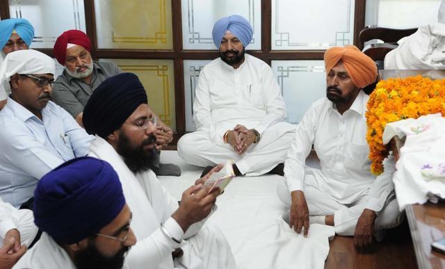 Balbir Singh Sidhu, MLA from Mohali, at a religious ceremony, in their respective offices after taking charge as ministers in the Congress government of Punjab, at the state secretariat in Chandigarh on Tuesday. Balbir Singh Sidhu, MLA from Mohali, at a religious ceremony, in their respective offices after taking charge as ministers in the Congress government of Punjab, at the state secretariat in Chandigarh on Tuesday.