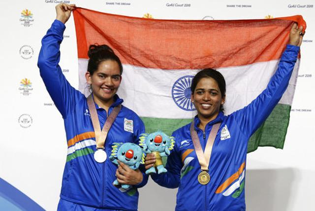 Silver medallist Anjum Moudgil (left) with Tejaswini Sawant, who won gold in the women's 50m Rifle 3P event at the Belmont Shooting Centre during the 2018 Commonwealth Games (CWG 2018) in Gold Coast on April 13. (AP) Silver medallist Anjum Moudgil (left) with Tejaswini Sawant, who won gold in the women's 50m Rifle 3P event at the Belmont Shooting Centre during the 2018 Commonwealth Games (CWG 2018) in Gold Coast on April 13. (AP)