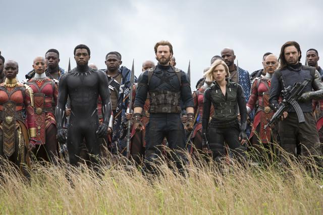 This image released by Marvel Studios shows, front row from left, Danai Gurira, Chadwick Boseman, Chris Evans, Scarlet Johansson and Sebastian Stan in a scene from Avengers: Infinity War, premiering on April 27. (AP)