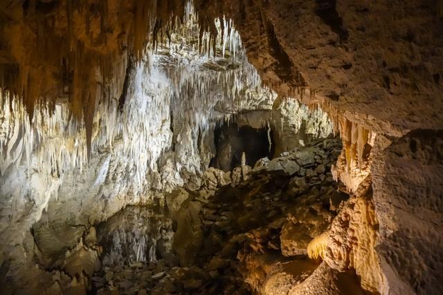 Under the green hills of Waitomo lies a labyrinth of caves, sinkholes and underground rivers. (Shutterstock) Under the green hills of Waitomo lies a labyrinth of caves, sinkholes and underground rivers. (Shutterstock)
