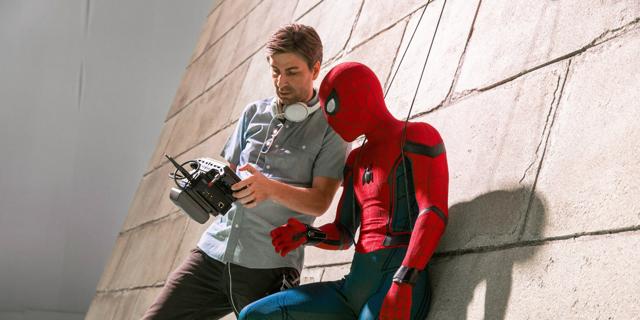 Jon Watts with Tom Holland on Spider-Man: Homecoming. Jon Watts with Tom Holland on Spider-Man: Homecoming.