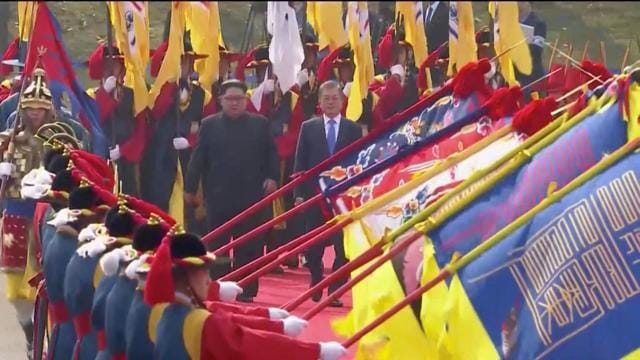 South Korean President Moon Jae-in and North Korean leader Kim Jong Un at a welcome ceremony at the inter-Korean summit at the truce village of Panmunjom, in this still frame taken from video, South Korea April 27, 2018. (Host Broadcaster via Reuters) South Korean President Moon Jae-in and North Korean leader Kim Jong Un at a welcome ceremony at the inter-Korean summit at the truce village of Panmunjom, in this still frame taken from video, South Korea April 27, 2018. (Host Broadcaster via Reuters)