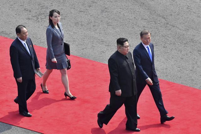 North Korean leader Kim Jong Un, second from right, walks with South Korean President Moon Jae-in, right, to hold their meeting at the border village of Panmunjom in Demilitarized Zone Friday, April 27, 2018. (AP) North Korean leader Kim Jong Un, second from right, walks with South Korean President Moon Jae-in, right, to hold their meeting at the border village of Panmunjom in Demilitarized Zone Friday, April 27, 2018. (AP)