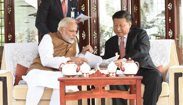 Chinese President Xi Jinping and India's Prime Minister Narendra Modi sit as they take a boat ride on the East Lake in Wuhan, China on April 28. (REUTERS) Chinese President Xi Jinping and India's Prime Minister Narendra Modi sit as they take a boat ride on the East Lake in Wuhan, China on April 28. (REUTERS)