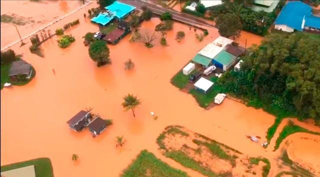 Image taken from video provided by the US Coast Guard shows flooding along Kauai's Hanalei Bay, Hawaii. (AP) Image taken from video provided by the US Coast Guard shows flooding along Kauai's Hanalei Bay, Hawaii. (AP)