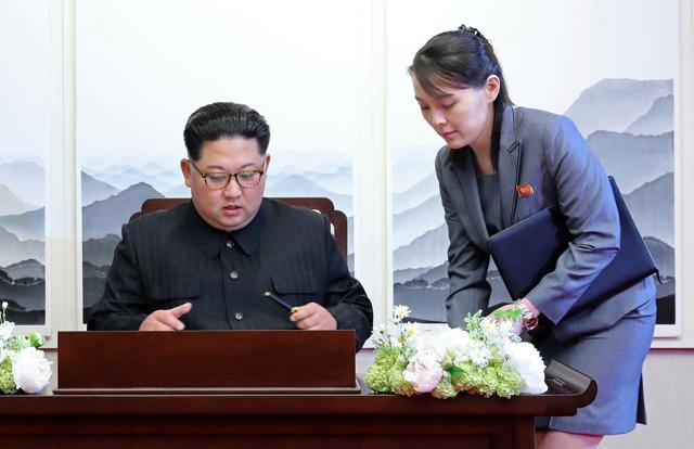 North Korean leader Kim Jong Un signs a guestbook next to his sister Kim Yo Jong, right, inside the Peace House at the border village of Panmunjom in Demilitarized Zone. (AP File Photo) North Korean leader Kim Jong Un signs a guestbook next to his sister Kim Yo Jong, right, inside the Peace House at the border village of Panmunjom in Demilitarized Zone. (AP File Photo)