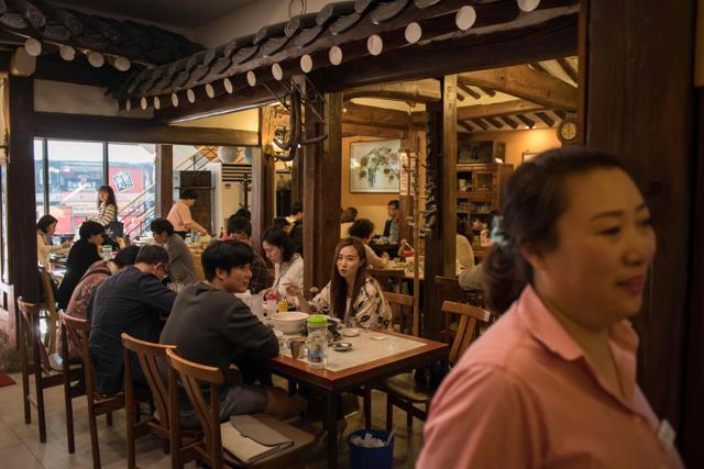Diners eat at the Nampo Myeonok noodle bar. (AFP) Diners eat at the Nampo Myeonok noodle bar. (AFP)
