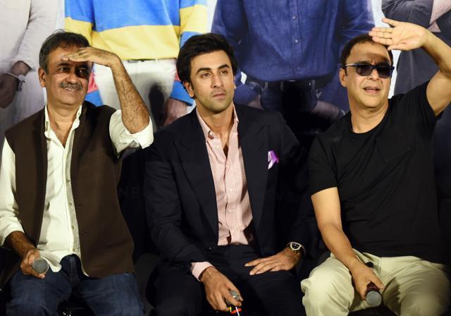 Indian Bollywood actor Ranbir Kapoor (C) looks on next to film Director Rajkumar Hirani (L) and producer Vidhu Vinod Chopra during the teaser launch of his upcoming Indian biographical drama Hindi film Sanju. (AFP)