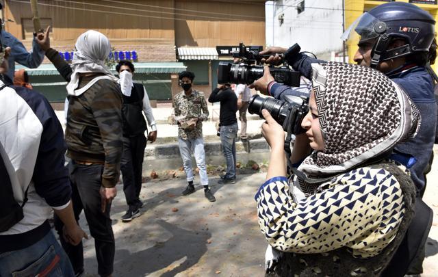 Srinagar , India - April 5, 2018: Sana Mattoo, a freelance photographer, during a protest in Srinagar , April 5, 2018. (Ajay Aggarwal/HT Photo) Srinagar , India - April 5, 2018: Sana Mattoo, a freelance photographer, during a protest in Srinagar , April 5, 2018. (Ajay Aggarwal/HT Photo)