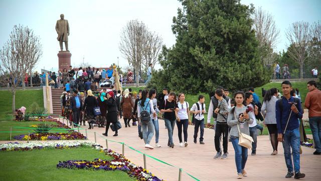 People walking in front of the statue of Islam Karimov, who ruled the country from before independence in 1991 until his death in 2016. (AFP) People walking in front of the statue of Islam Karimov, who ruled the country from before independence in 1991 until his death in 2016. (AFP)