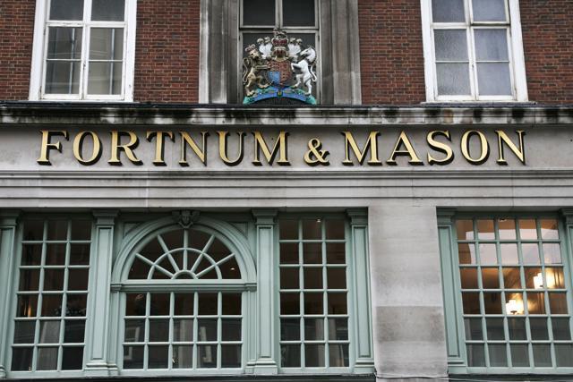 The Fortnum & Mason store in London, seen bearing the Royal Coat of Arms above, declaring by appointment to Her Majesty Queen Elizabeth II. (AP) The Fortnum & Mason store in London, seen bearing the Royal Coat of Arms above, declaring by appointment to Her Majesty Queen Elizabeth II. (AP)
