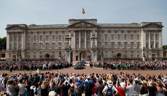 Queen Elizabeth II leaves Buckingham Palace with Prince Charles to travel to parliament for her speech at the official State Opening of Parliament in London. (AP) Queen Elizabeth II leaves Buckingham Palace with Prince Charles to travel to parliament for her speech at the official State Opening of Parliament in London. (AP)