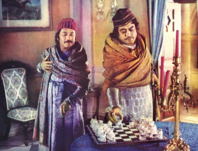 (L-R) The chess players: Saeed Jaffrey as Mir Roshan Ali and Sanjeev Kumar as Mirza Sajjad Ali. The two noblemen who are devoted to chess is presented against the background of the machinations of the British East India Company officials. (Photo courtesy: My Adventures with Satyajit Ray / HarperCollins) (L-R) The chess players: Saeed Jaffrey as Mir Roshan Ali and Sanjeev Kumar as Mirza Sajjad Ali. The two noblemen who are devoted to chess is presented against the background of the machinations of the British East India Company officials. (Photo courtesy: My Adventures with Satyajit Ray / HarperCollins)