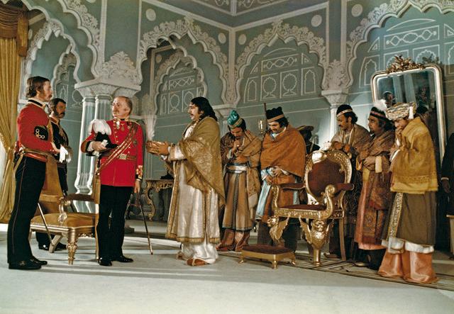 Wajid Ali Shah (Amjad Khan) abdicates by offering the crown of Awadh to General Outram (Richard Attenborough), who is attended by Captain Weston (Tom Alter). (Photo: Nemai Ghosh, courtesy: Photo courtesy: My Adventures with Satyajit Ray / HarperCollins) Wajid Ali Shah (Amjad Khan) abdicates by offering the crown of Awadh to General Outram (Richard Attenborough), who is attended by Captain Weston (Tom Alter). (Photo: Nemai Ghosh, courtesy: Photo courtesy: My Adventures with Satyajit Ray / HarperCollins)