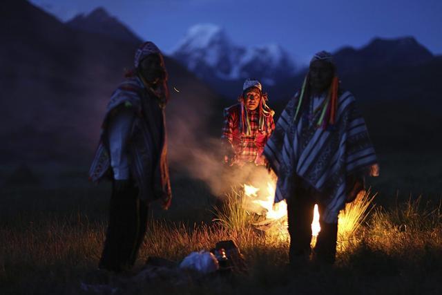 Andean farmers take part in a ceremony honouring Mother Earth and Father Snowy Mountain. (AP) Andean farmers take part in a ceremony honouring Mother Earth and Father Snowy Mountain. (AP)