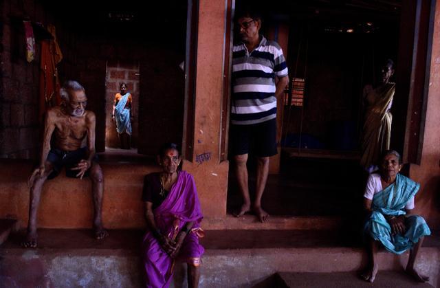 The Pujari family from Rameshwar village, which is expected lose maximum homes, schools and temples for proposed pipelines for the refinery near Vijaydurg creek. (Anshuman Poyrekar/HT Photo) The Pujari family from Rameshwar village, which is expected lose maximum homes, schools and temples for proposed pipelines for the refinery near Vijaydurg creek. (Anshuman Poyrekar/HT Photo)