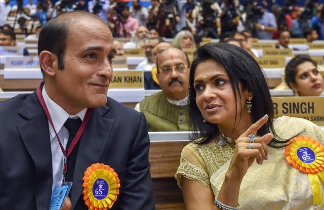 Dadasaheb Phalke awardee Vidod Khanna's wife Kavita and son Akshay Khanna during the 65th National Film Awards function at Vigyan Bhavan in New Delhi. (PTI) Dadasaheb Phalke awardee Vidod Khanna's wife Kavita and son Akshay Khanna during the 65th National Film Awards function at Vigyan Bhavan in New Delhi. (PTI)