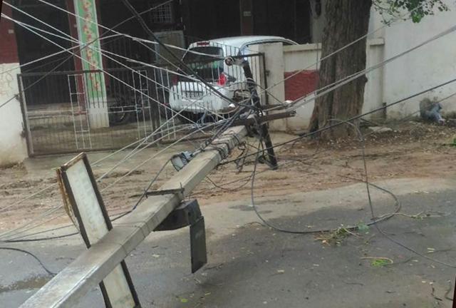 An uprooted electric pole in Alwar. (HT Photo) An uprooted electric pole in Alwar. (HT Photo)