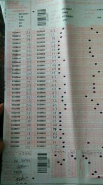 The OMR sheet where examinee with roll no 338935 has received 2 marks in science. The OMR sheet where examinee with roll no 338935 has received 2 marks in science.