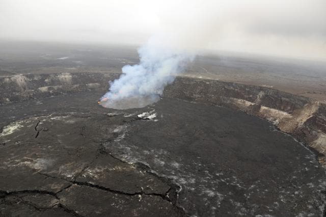 This US Geological Survey photo shows the eruption at the summit of Kilauea Volcano near Honolulu. (AP Photo) This US Geological Survey photo shows the eruption at the summit of Kilauea Volcano near Honolulu. (AP Photo)