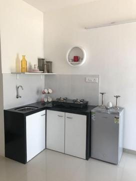 What is it like living in a 200-sq-ft house? ‘You have to adopt a minimalist lifestyle. No more than four pairs of shoes per person; and only one shelf and one platform in the kitchen,’ says Niharika Saluje, who lives in a 200-sq-ft home in Ghatkopar with her husband and baby daughter. What is it like living in a 200-sq-ft house? ‘You have to adopt a minimalist lifestyle. No more than four pairs of shoes per person; and only one shelf and one platform in the kitchen,’ says Niharika Saluje, who lives in a 200-sq-ft home in Ghatkopar with her husband and baby daughter.