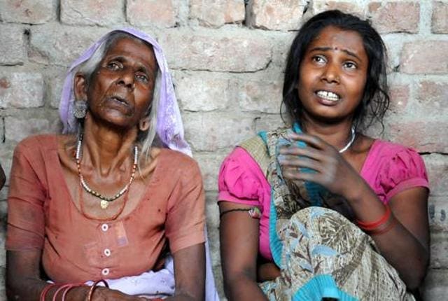 Distraught grandmother and mother of Virendra,a victim of killer dog attack, in Budhanapur village on Friday. (Dheeraj Dhawan/HT Photo ) Distraught grandmother and mother of Virendra,a victim of killer dog attack, in Budhanapur village on Friday. (Dheeraj Dhawan/HT Photo )