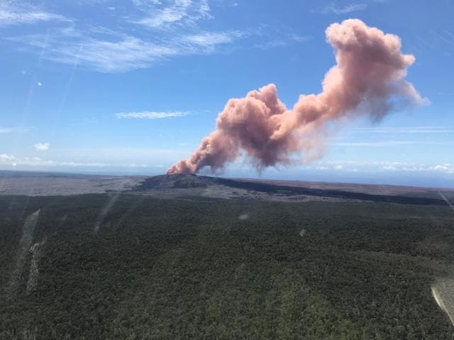A plume of ash rises from Kilauea Volcano, one of five on the island, after a series of earthquakes over the last couple of days, in Hawaii. (USGS via Reuters Photo) A plume of ash rises from Kilauea Volcano, one of five on the island, after a series of earthquakes over the last couple of days, in Hawaii. (USGS via Reuters Photo)