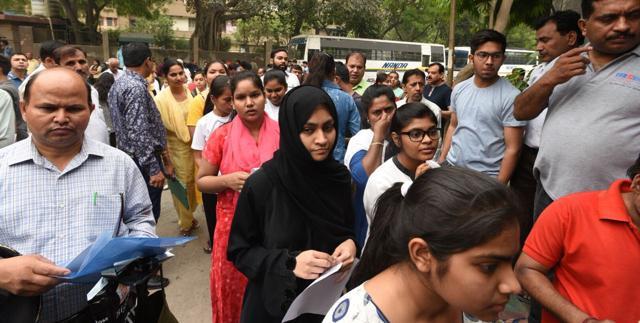 Students queue up to enter the exam centre at Alhcon International School in Mayur Vihar, Delhi (Raj K Raj/HT Photo) Students queue up to enter the exam centre at Alhcon International School in Mayur Vihar, Delhi (Raj K Raj/HT Photo)