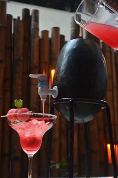 Watermelon keg is a cool way to serve drinks at a party.