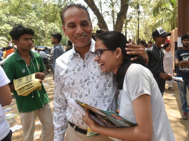 A student celebrates with her father after taking her the NEET 2018 in Bhopal. (Mujeeb Faruqui/HT Photo) A student celebrates with her father after taking her the NEET 2018 in Bhopal. (Mujeeb Faruqui/HT Photo)