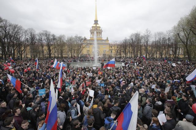 Protesters attend a rally in St. Petersburg, Russia, two days ahead of the inauguration of Vladimir Putin for a fourth term as Russian president. (AP File Photo)