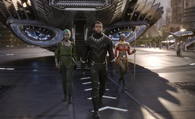 This image released by Disney shows Lupita Nyong'o, left, and Chadwick Boseman and Danai Gurira in a scene from Marvel Studios' Black Panther. (AP) This image released by Disney shows Lupita Nyong'o, left, and Chadwick Boseman and Danai Gurira in a scene from Marvel Studios' Black Panther. (AP)