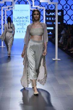 Payal Singhal has created a bralette with dhoti pants and cape that seems apt for a sangeet night. Payal Singhal has created a bralette with dhoti pants and cape that seems apt for a sangeet night.