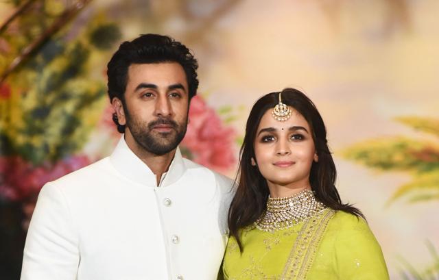 Indian Bollywood actors Ranbir Kapoor (L) and Alia Bhatt pose for a picture during the wedding reception of actress Sonam Kapoor and businessman Anand Ahuja. (AFP) Indian Bollywood actors Ranbir Kapoor (L) and Alia Bhatt pose for a picture during the wedding reception of actress Sonam Kapoor and businessman Anand Ahuja. (AFP)