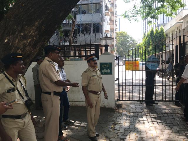 Police officials outside IPS officer Himanshu Roy’s apartment, near Mantralaya, south Mumbai, on Friday afternoon. (Bhushan Koyande/HT Photo) Police officials outside IPS officer Himanshu Roy’s apartment, near Mantralaya, south Mumbai, on Friday afternoon. (Bhushan Koyande/HT Photo)