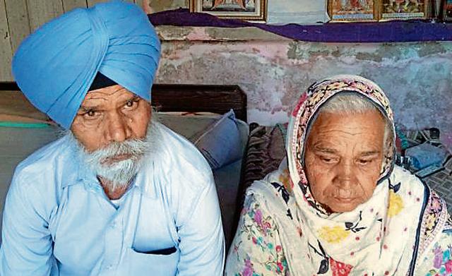 Parents of fireman Manpreet Singh at their residence in Meherban village in Ludhiana on Friday. (HT Photo)