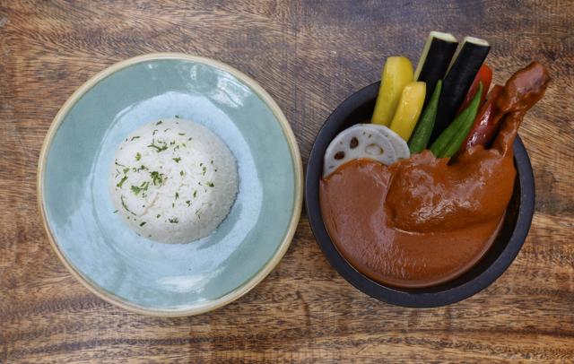 The Hokkaido chicken curry was more Goan than Japanese karē, but served with fluffy jasmine rice was nonetheless comforting and flavoursome. (Satyabrata Tripathy / HT Photo)