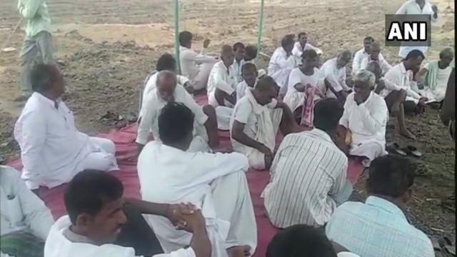 Villagers of Tarkaspet stage a sit-in demanding gram panchayat headquarters in their village. (ANI/Twitter) Villagers of Tarkaspet stage a sit-in demanding gram panchayat headquarters in their village. (ANI/Twitter)