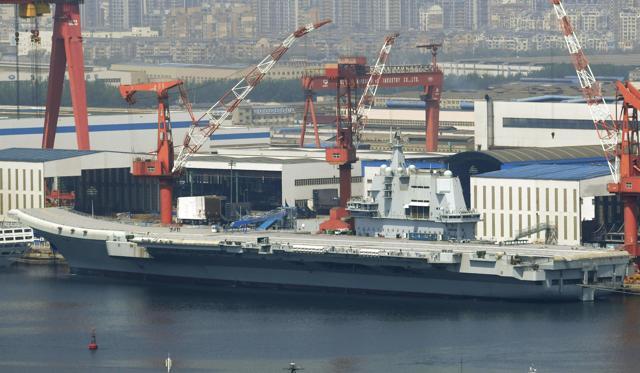 This May 9, 2018, photo released by China's Xinhua News Agency shows China's aircraft carrier Liaoning at a shipyard in Dalian. (AP) This May 9, 2018, photo released by China's Xinhua News Agency shows China's aircraft carrier Liaoning at a shipyard in Dalian. (AP)