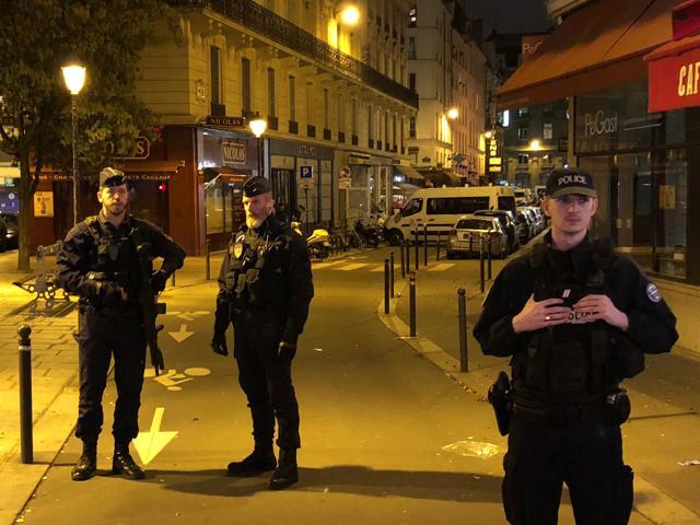 French police secure a street after a man killed a passer-by in a knife attack in the heart of Paris and injured four others before being shot dead by police, according to French authorities in Paris, France, May 12. (REUTERS) French police secure a street after a man killed a passer-by in a knife attack in the heart of Paris and injured four others before being shot dead by police, according to French authorities in Paris, France, May 12. (REUTERS)